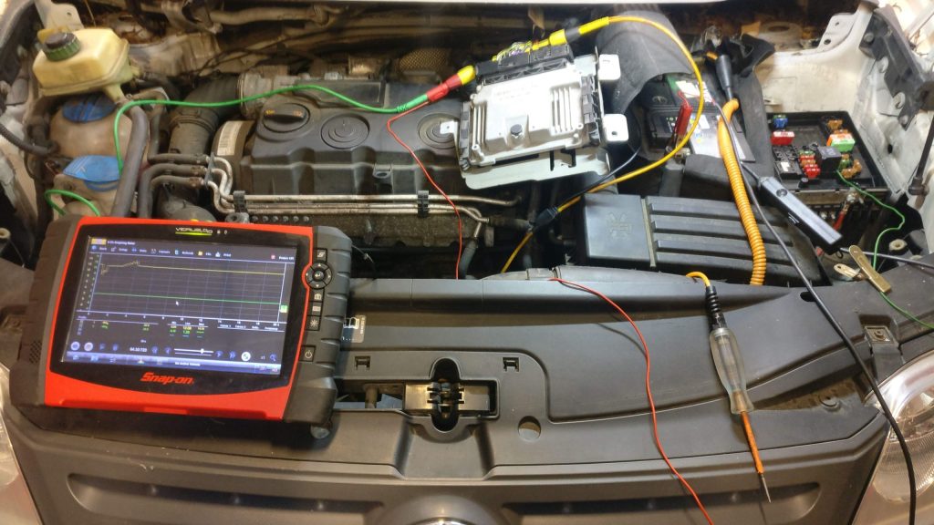 Figure 3.1: Scope hookup and breakout leads on engine ECU harness.